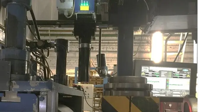 Industrial laser speed sensor system installed on heavy machinery for precise process control and velocity monitoring.