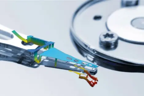 Hard drive read/write head with colored surface topology map highlighting precise step height and surface measurements